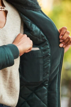 Green Faux Fur Hooded Parka With Gold Zip Pockets -Opal & Oak Store web 103 a22tk530nl0003 s22bd010be0010 a22ow003gn0050 252