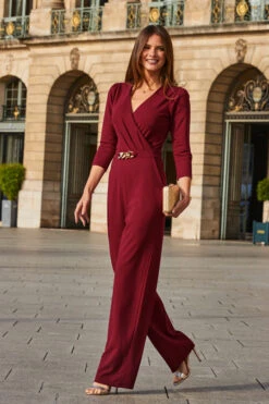 Burgundy Faux Wrap Chain Detail Wide Leg Jumpsuit 8 Burgundy Faux Wrap Chain Detail Wide Leg Jumpsuit -Opal & Oak Store web 2308 49 a23jj005rd0004 49 069 rt